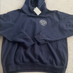 Sporty & Rich Dark Blue Hoodie XL NWT
All Cotton.